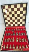 Cast metal figural travel chess set in folding case