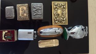 Box of vintage matchbox covers, lighters & vesta c