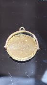 9ct Gold spinning coin fob Weight 2.3g
