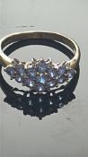 9ct Gold ring set with blue stones Weight 2.4g Siz