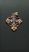 9ct Gold pendant set with blue stones Weight 1.9g