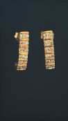 Pair of 18ct Gold & diamond earrings - 12 small di
