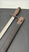 Military bayonet scabbard with crows foot dated 1909