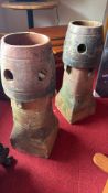 Pair of terracotta ventilated chimney pots