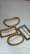 Four paste-set brass buckle frames, c.1800-30