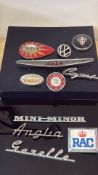 Collection of vintage car badges