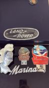 Collection of vintage car badges to include butlin
