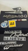 Collection of vintage car badges