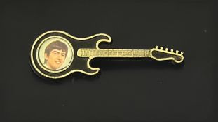 Beatles George Harrison enamel guitar pin badge, 1960s