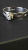 18ct White gold ring set with raised solitaire dia
