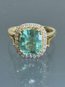 Colombian Emerald and diamond ring set in 18ct gol