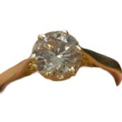 Solitaire diamond ring 1.7ct faint yellow diamond set on an 18 ct gold band. Size N