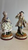 Rococo style porcelain figurine pair