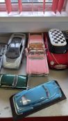 Group of five large-scale model cars