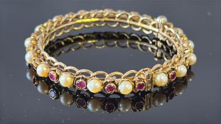 Victorian Yellow metal bangle set with pearl & rub