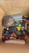 Box of vintage die-cast vehicles and costume jewellery