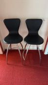 Pair of contemporary black vinyl bar stools