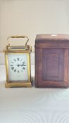 French brass carriage clock in leather case