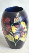 Moorcroft â€˜Hibiscusâ€™ cobalt ground vase