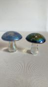 Two iridescent art glass mushroom paperweights by John Ditchfield