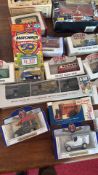 Collection of boxed die-cast model vehicles and tins