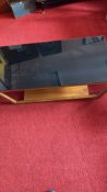 Calligaris smoked glass and walnut coffee table