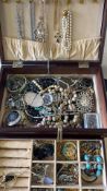 Unsorted box of costume jewellery
