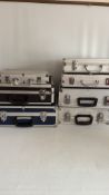 Eight aluminium flight cases
