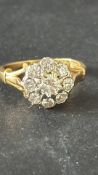 18ct Gold ring set with diamond cluster, central s