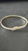 Silver bangle set with white stones