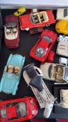 Collection of die-cast model cars and scooter