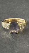 9ct Gold ring set with diamond & tanzanite Weight