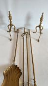 Brass andirons and three fire tools