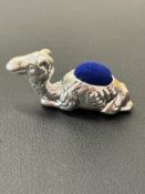 Silver camel pin cushion