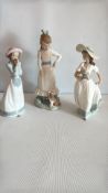 Three Spanish-style porcelain girl figurines