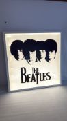 The Beatles illuminated wall sign