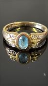 9ct God ring set with 4 diamonds & central aquamar