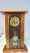 Oak cased mantel regulator clock