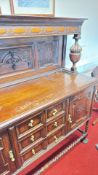 Jacobean Revival carved oak sideboard