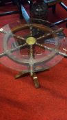 Shipâ€™s wheel glass-top occasional table