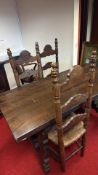 Mid-Century oak refectory dining table with four ladder-back chairs