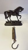 Cast iron horse figure and hanging spring balance