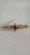 Boxed 9ct Gold & ruby brooch
