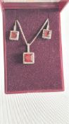Boxed silver & ruby necklace & earring set