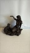 Bronze-finish figural group: woman and spaniel