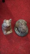 Pair of cast stone pig and rabbit garden ornaments