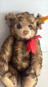 Steiff miniature mohair teddy bear with button-in-ear tag