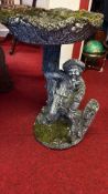 Cast stone figural bird-bath