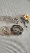 5 silver brooches