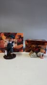 Pair of Nadal Studio resin child figurines with boxes